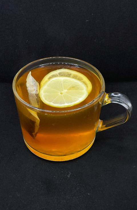 Thé chaud et miel et citron